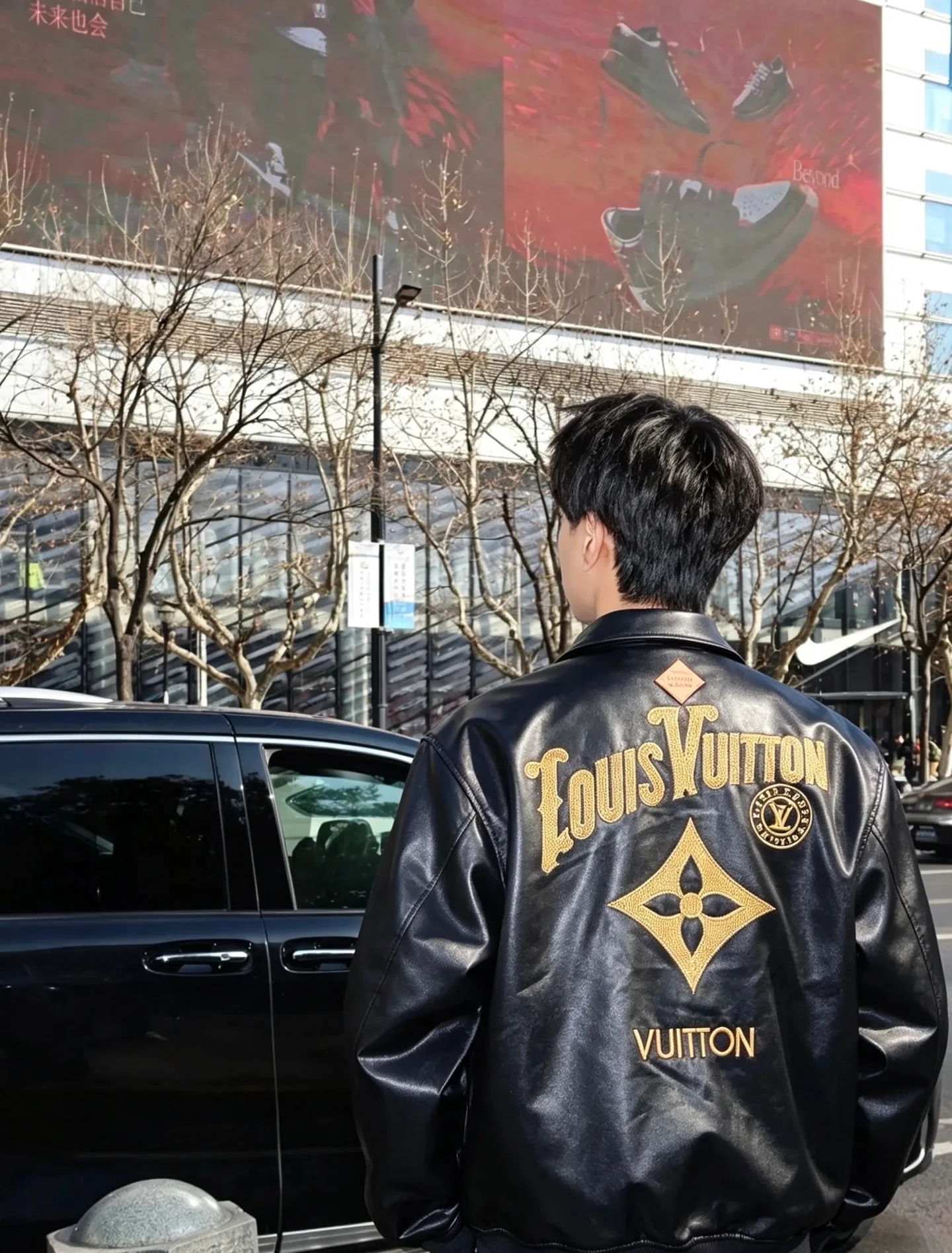 Louis Vuitton/Louis Vuitton black gold embroidered logo lapel leather jacket
